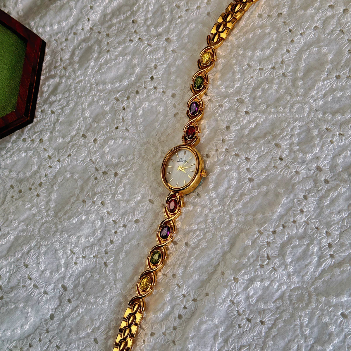 High-End Women’s Watch with Colorful Tourmalines, Diamonds, and an Oval Mother-of-Pearl Dial